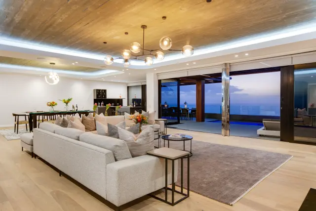 Sample photo: a living room that opens to a sea view